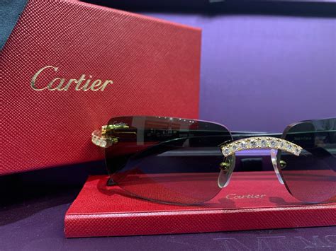 cartier glasses buffs with diamonds.